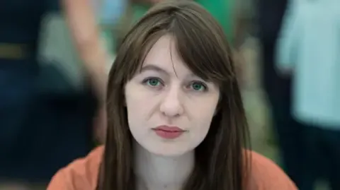 Sally Rooney claims she cannot visit the UK over arrest fears